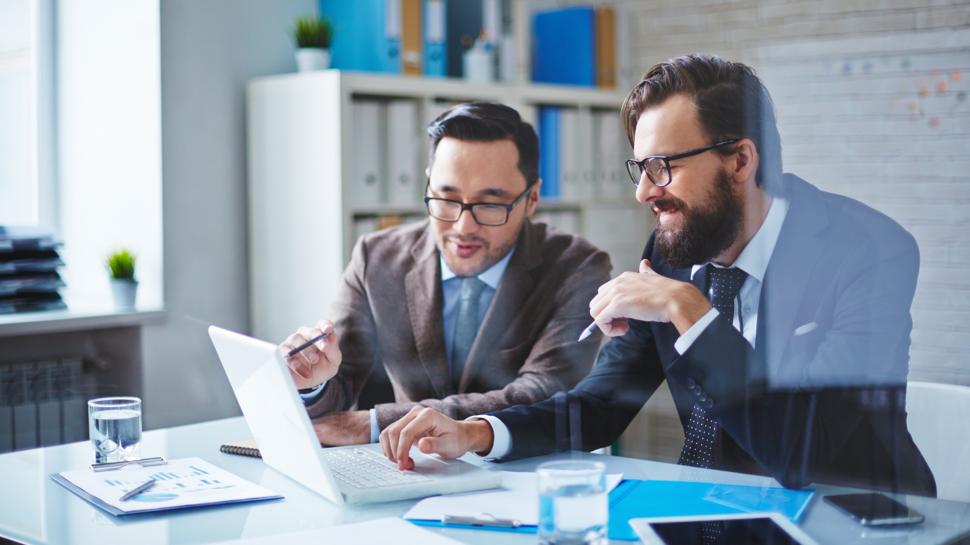 Business professionals collaborating with AI solutions
